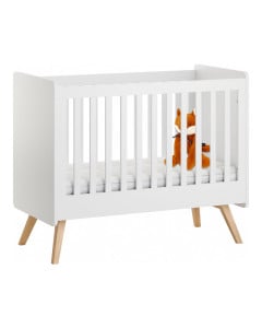 Lit bébé 60x120 cm de la collection Vintage Vox, finition blanche avec pieds en bois massif de chêne, ambiance scandinave épurée