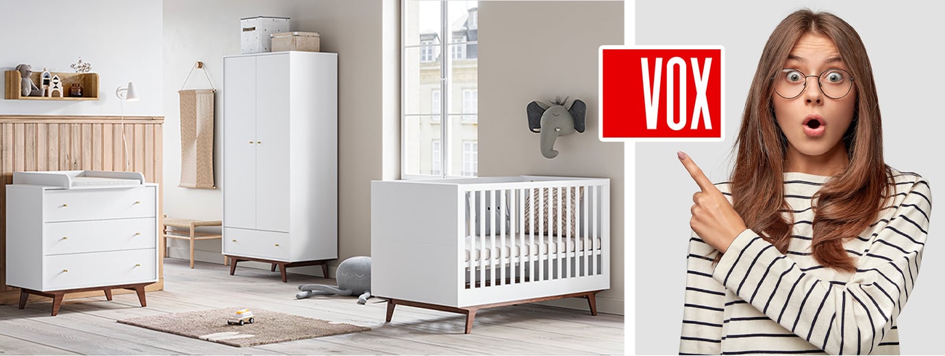 Chambre bébé équipée de meubles blanc et noyer de la collection MID du fabricant polonais VOX