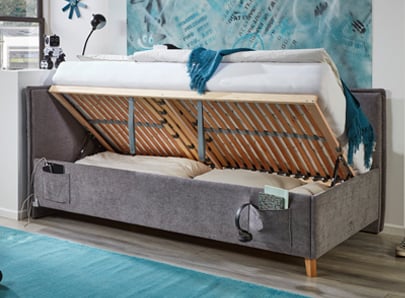 Lit coffre enfant en bois avec espace de rangement intégré, design sécurisé et fonctionnel